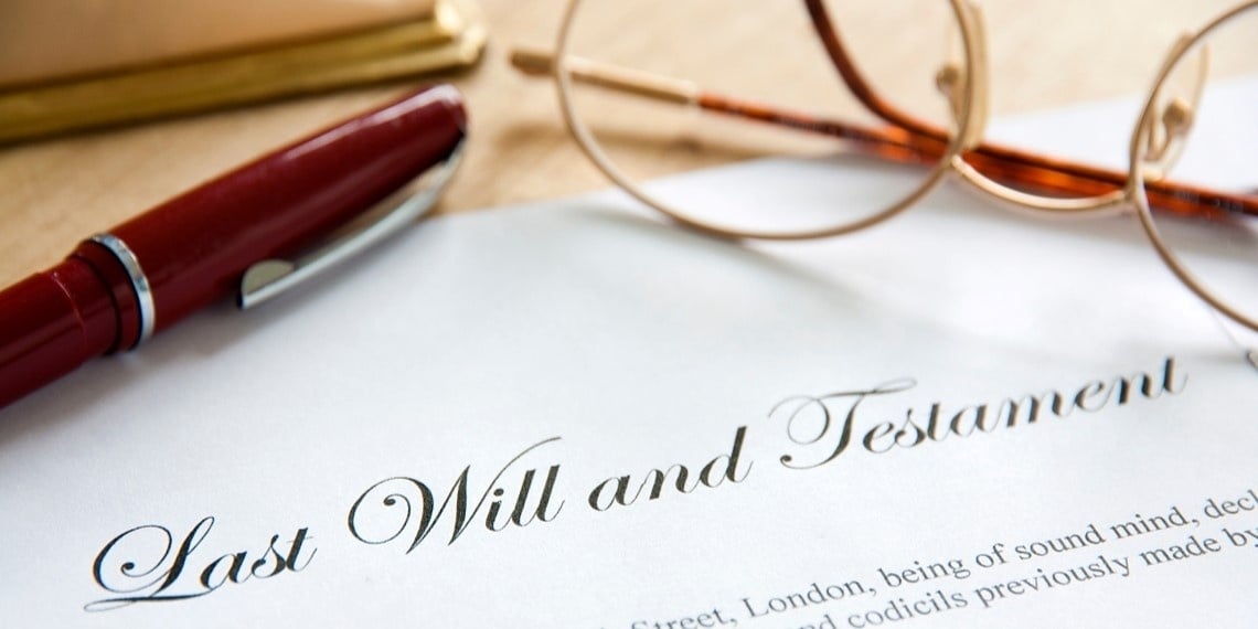 Nonprofit planned giving program represented by an up-close of a will and glasses
