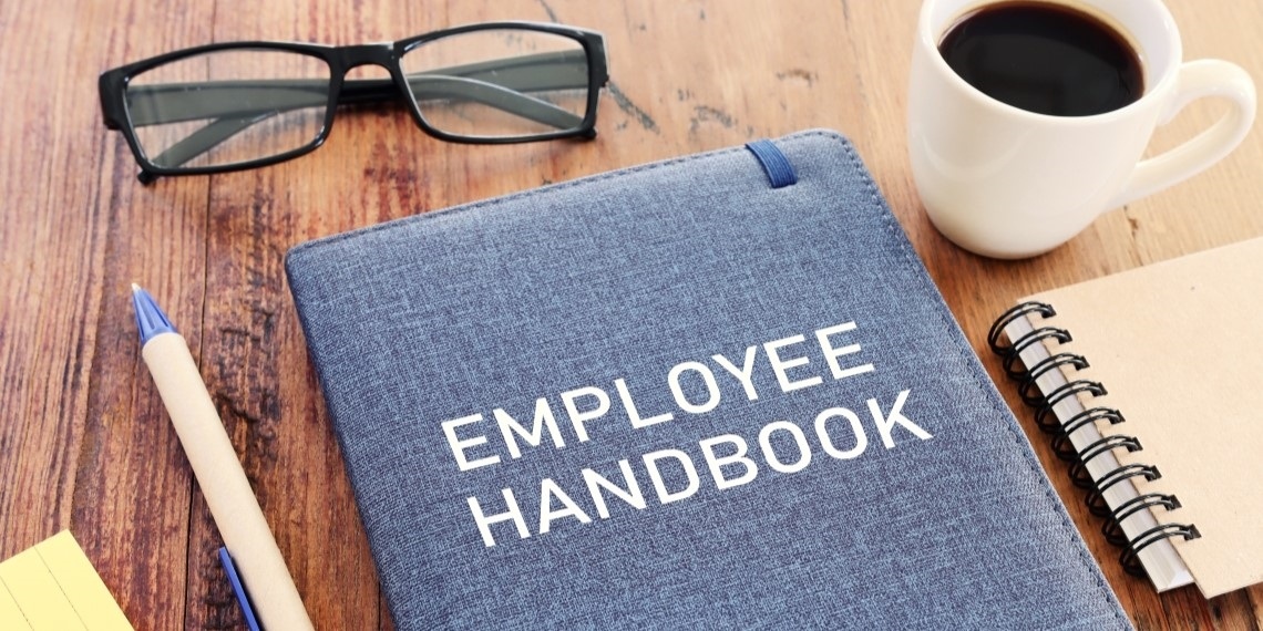 Best nonprofit staffing recruiting firm visual of an employee handbook for onboarding