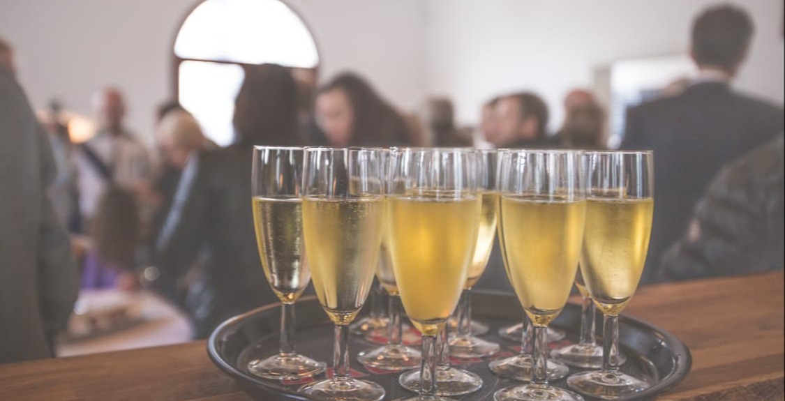 Flutes of champagne represent fundraising event and how to best engage and cultivate your donors for better results