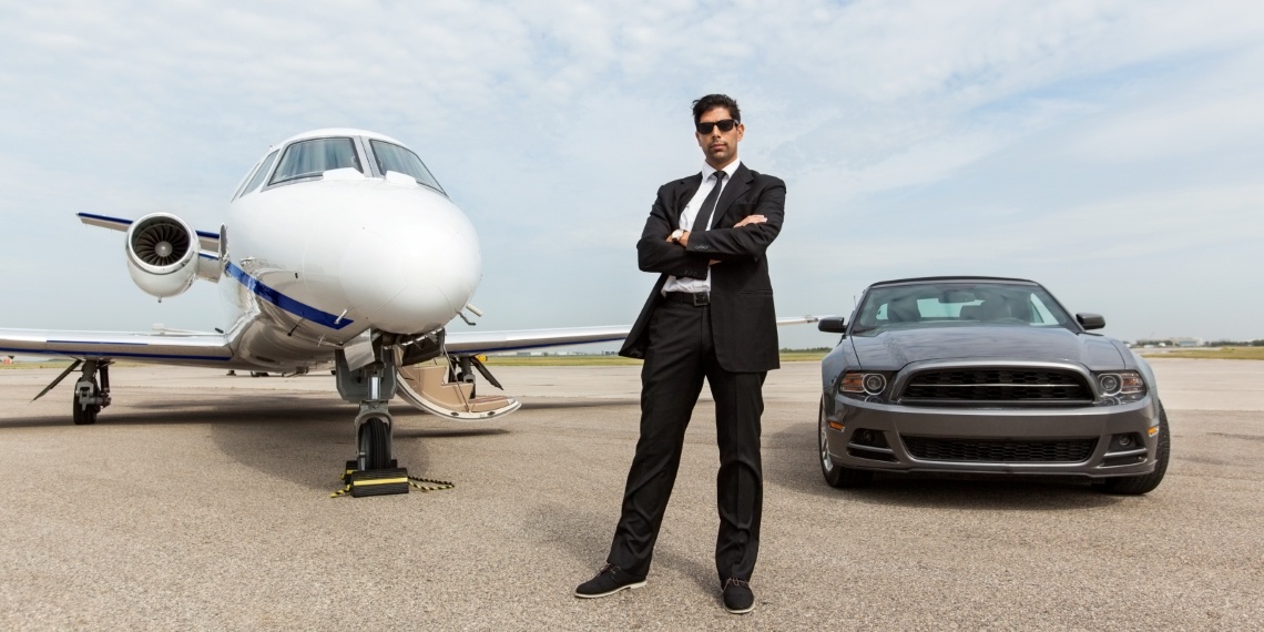 How to identify probable major donor visual of a man standing next to a car and plane