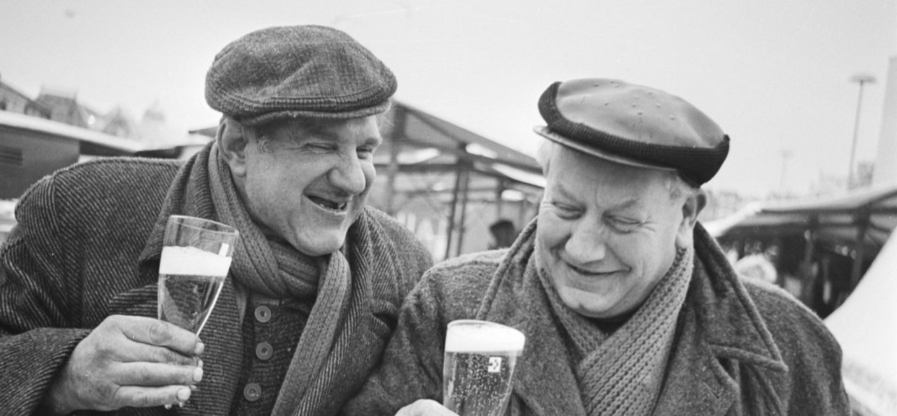 donor cultivation communication visual of two men enjoying a drink together 